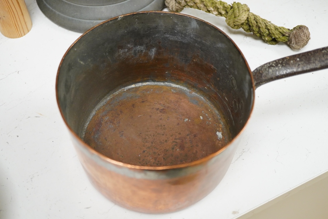 A bronze bell dated 1839 and two Victorian copper and brass saucepans